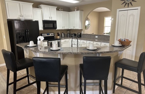 Calabria Casa | 6 bed 5.5 bath Home with Pool 14 MINUTES AWAY from Disney. We’re back on VRBO!
