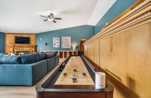 Prudenville Casa | 6BR Houghton Lake House w/ Indoor Pool, Hot Tub, and Golf Simulator - Sleeps 24