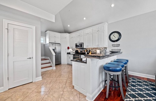 Northeast Virginia Beach Casa | 7 beds! One block from new SURF Wave Pool and beach! Bikes included!