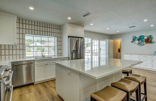 Palma Sola Casa | 75 Palms! 8 Bedroom Home by RedAwning