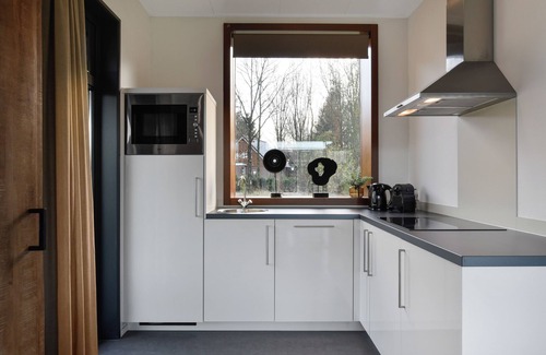 Hoge Hexel Chalet De Esquí | 8-person bungalow in the holiday park Landal Sallandse Heuvelrug