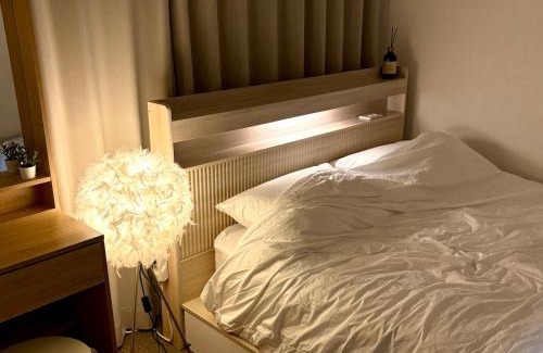 Deungchon-dong Apartamento | 9호선 도보5분,1층,퀸침대3,방2,호텔침구,5인추천,아늑함,가양,등촌,염창,공항노선
