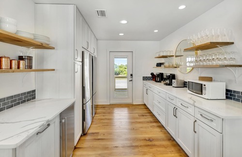 St. George Island Casa | 9 BR 7.5 BA Gulf Coast Beachfront Paradise with Private Pool and Dock-Sleeps 20+