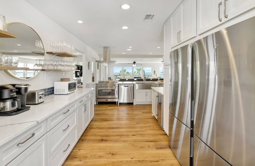 St. George Island Casa | 9 BR 7.5 BA Gulf Coast Beachfront Paradise with Private Pool and Dock-Sleeps 20+