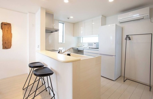 Yokosuka Casa | A 3storey building with an ocean view and rooftop / Yokosuka Kanagawa