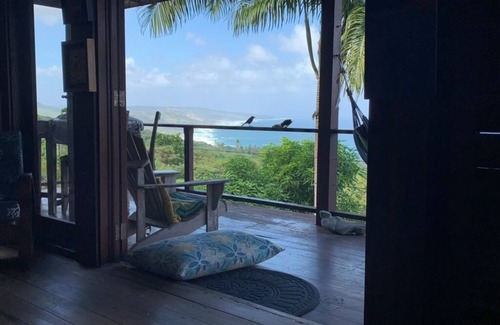 Ragged Point Casa | Una hermosa casa de madera construida entre los árboles con vistas a la costa atlántica.