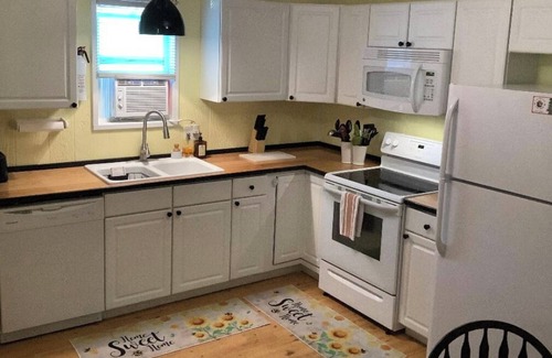 Pipestem Cabina | A cabin for the whole family, complete with washer & dryer and a swing set