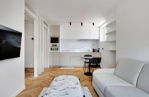 Quartier de Rochechouart Apartamento | A Charming 1-BR/1BA in Montmartre