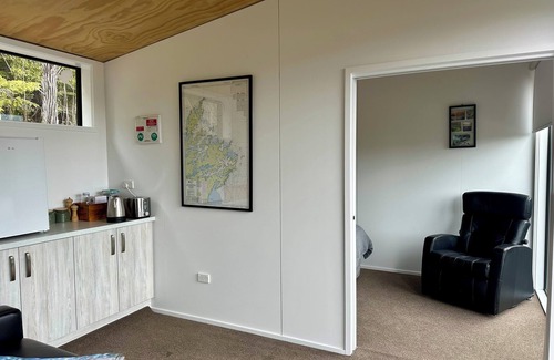 Moetapu Bay Cabina | A cosy two bedroom off-grid cabin, the perfect place to rest, relax & recharge.