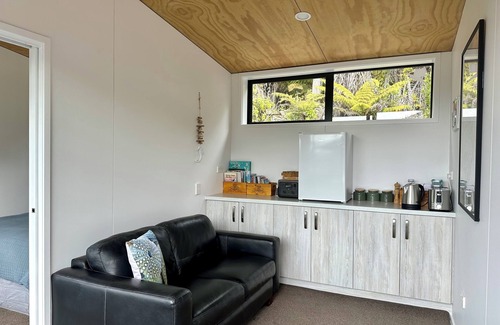 Moetapu Bay Cabina | A cosy two bedroom off-grid cabin, the perfect place to rest, relax & recharge.