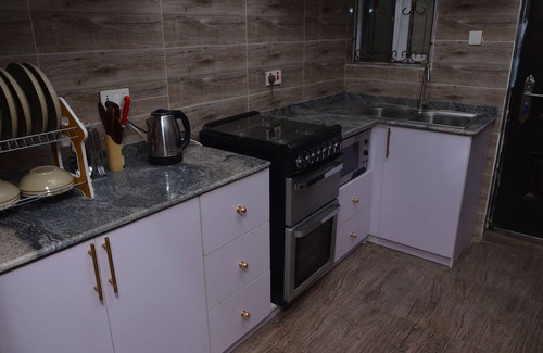 Onitsha Apartamento | A cozy home apartment that serves as home away from home.
