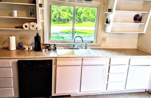 Pottawattamie Park Casa | A cozy little house along Trail Creek awaits you. Relax. Unwind. Enjoy.