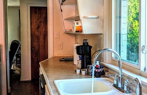 Pottawattamie Park Casa | A cozy little house along Trail Creek awaits you. Relax. Unwind. Enjoy.