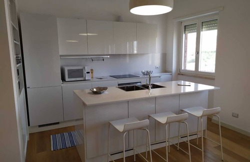 Poetto Casa | Un nuevo apartamento de diseño de 100 metros cuadrados a poca distancia de la playa.