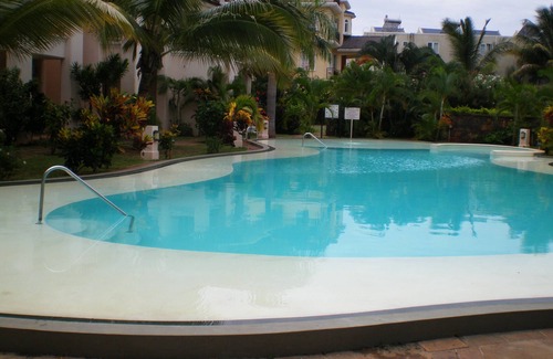 Flic-en-Flac Apartamento | Un paraíso de vacaciones en el corazón de Flic en Flac, una hermosa villa turística