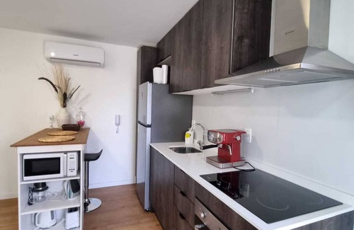 Pocitos Apartamento | A modern loft with a smart key system, located close to a Mall and beaches.