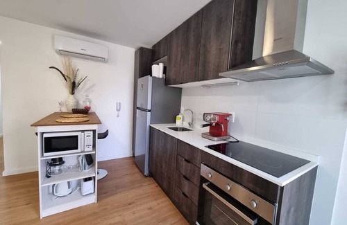 Pocitos Apartamento | A modern loft with a smart key system, located close to a Mall and beaches.