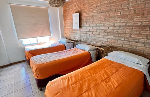 San Juan Hotel | A pocos pasos de puntos de interés turísticos, comerciales y financieros.