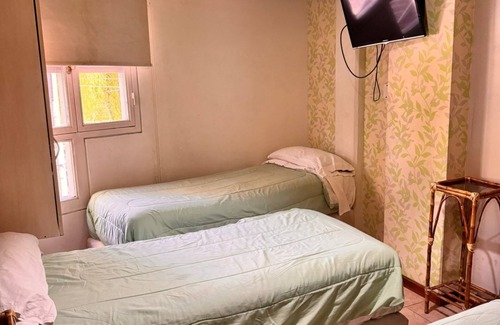 San Juan Hotel | A pocos pasos de puntos de interés turísticos, comerciales y financieros.