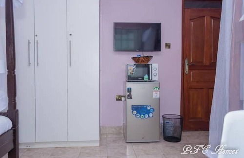 Ruiru Apartamento | A private room in a tranquil, suburban mansion