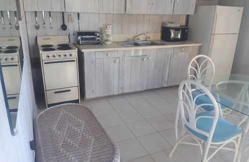 George Town Apartamento | A rare combination of central location and private island seclusion