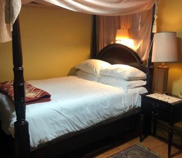 Hyde Park Casa | A secluded bedroom with a private full bathroom