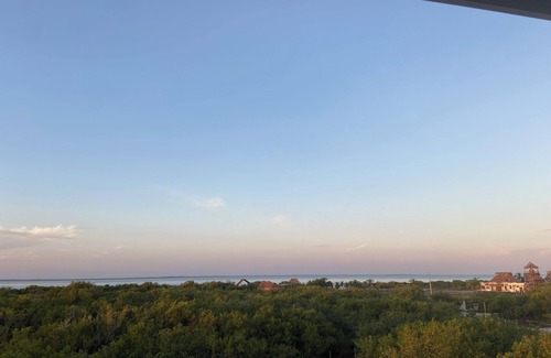 Isla Holbox Casa | A Spacious Ocean View Villa, steps away from Punta Cocos bioluminescence beach.