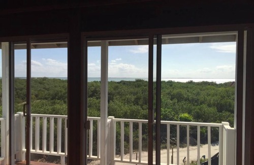 Isla Holbox Casa | A Spacious Ocean View Villa, steps away from Punta Cocos bioluminescence beach.