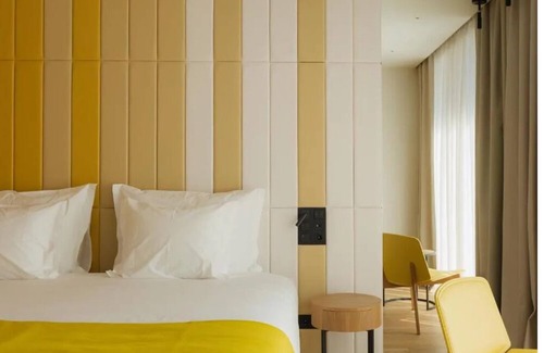 Sao Jorge de Arroios Hotel | A Stylish Lisbon Nest w/Rooftop Pool & Legendary Light Show Magic