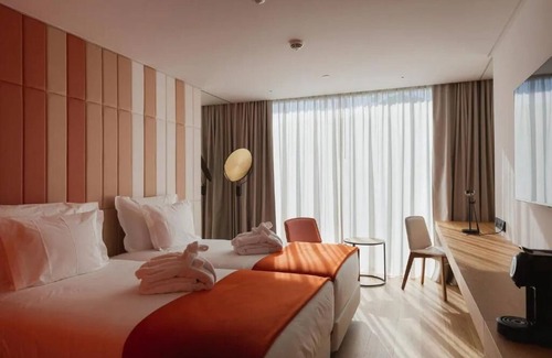Sao Jorge de Arroios Hotel | A Stylish Lisbon Nest w/Rooftop Pool & Legendary Light Show Magic