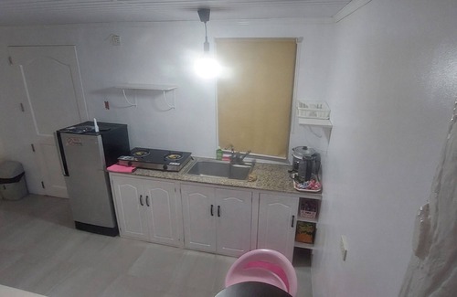 Puerto Princesa Apartamento | A touch of pink secret garden resort