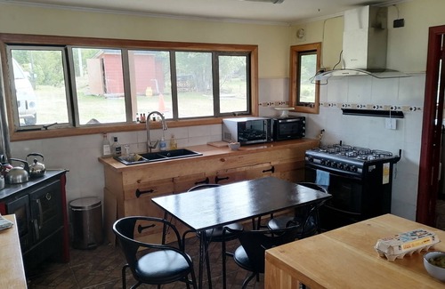 Coyhaique Casa | A Tranquil Escape in Patagonia: Experience the Charm of Lago Frío