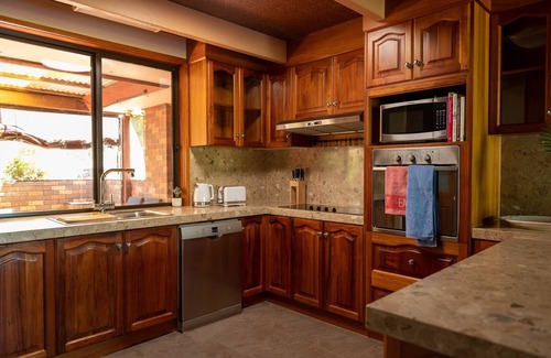 Driffield Otro | A tranquil & luxurious 4 bedroom home with a pool & wood fire