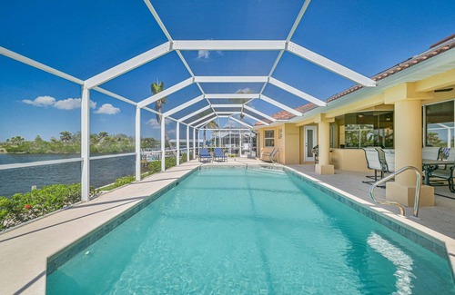 Burnt Store Casa | A True JEWEL on the Water - includes Boat and Spa. 500 OFF Summer Stays 2025