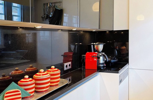Vouliagmeni Apartamento | A unique 3 level penthouse with a great sea view to Vouliagmeni Bay