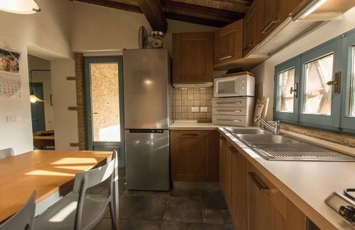 Abbadia a Isola Villa | Una villa con vistas a Monteriggioni y una piscina privada