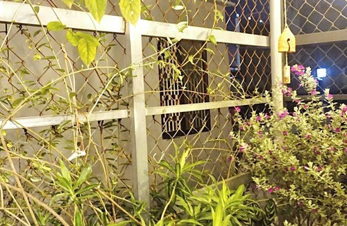 Downtown Ho Chi Minh City Apartamento | A Vintage Bedroom in District 1
