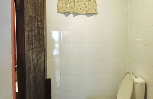 Downtown Ho Chi Minh City Apartamento | A Vintage Bedroom in District 1