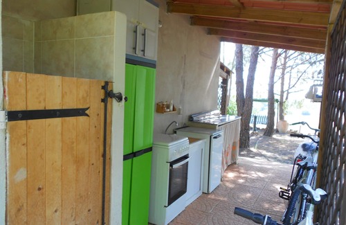 Santa Margherita di Pula Villa | Villa individual independiente rodeada de vegetación con horizonte sobre el mar