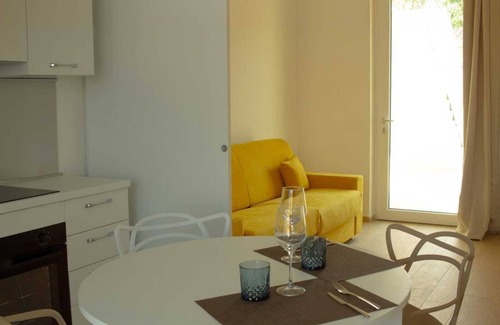 Lido Apartamento | Accoglienti Appartamenti Dallo Stile Moderno ed Elegante con Vista Piscina