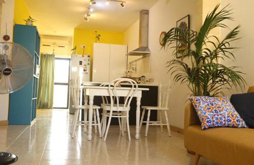 Balzan Apartamento | Adinkra Suits