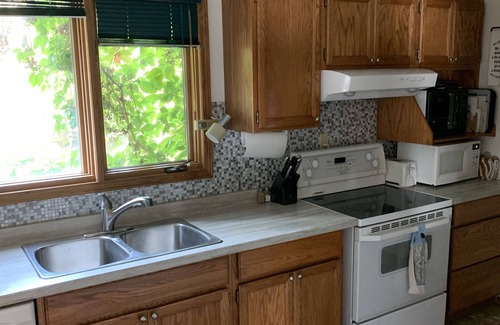 The Pas Casa | ¡La aventura te espera en este retiro junto al lago, # 9 Rocky Lake North!