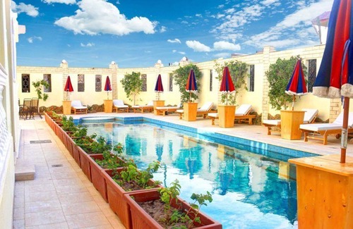 Al Ahyaa Apartamento | Aida Suites