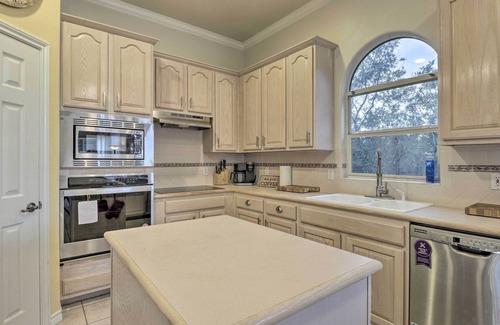 Travis Landing Villa | Airy Villa in Austin w/ Badminton/Volleyball Court