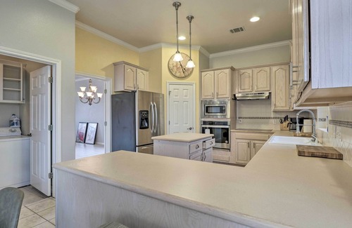 Travis Landing Villa | Airy Villa in Austin w/ Badminton/Volleyball Court