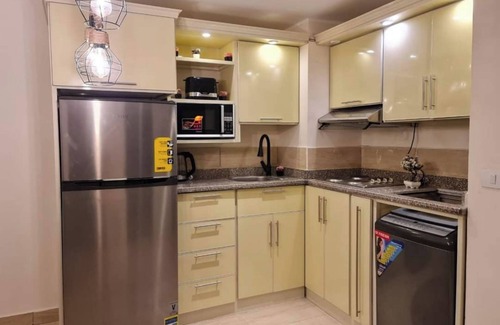Village Road Apartamento | Al dau Heights apartments