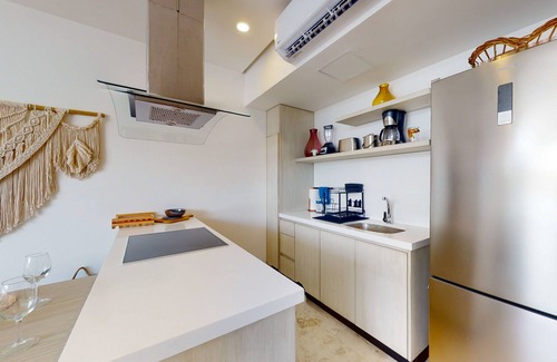Zama Apartamento | Aldea Zama condo with rooftop pool, private balcony, & great location