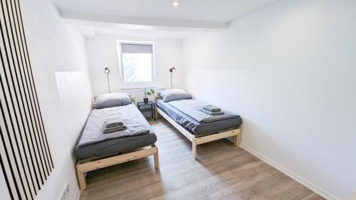 Ludwigsburg Apartamento | ALFA Ludwigsburg City Apartment 3 Zimmer für 5 Personen l Parkplatz l Bad I Küche l WIFI & SmartTV l Parking l Bathroom l Kitchen