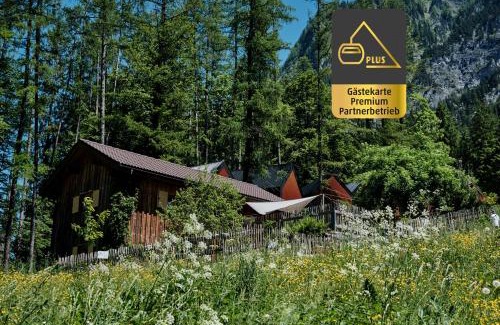 Brand Casa | Älmele - Waldchalets Brandnertal