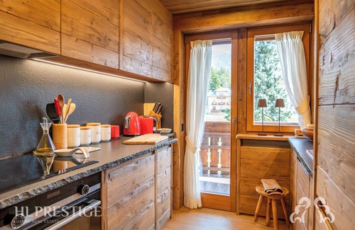 Cortina d'Ampezzo Historic Centre Apartamento | Alpenglow Cortina: where luxury becomes emotion